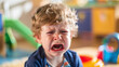 © Luluraschi - little toddler having a tantrum at day care center