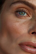 © Nataliia S. - Detailed Close-Up Photo of a Middle-aged Woman in Her 40s with Glowing, Healthy Skin, Without Makeup