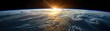 © Thamonchanok - Stunning sunrise over Earth as seen from space, showcasing the planet's curvature and atmospheric details against the dark expanse of the universe.
