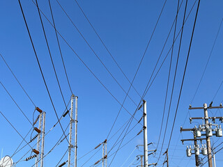 Wall Mural - Electricity tower under blue sky