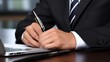 © urwa - businessman signing a document
