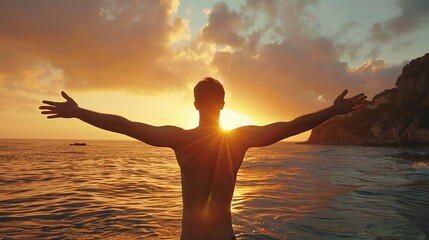 Wall Mural - Silhouette of a Man with Open Arms Enjoying Sunset on Mountain - Concept of Self-Love, Success, and Wellbeing