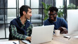 © Katsiaryna - Businessmen working on laptop computer in the office