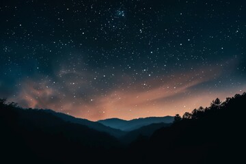 Wall Mural - silhouetted horizon under a night sky filled with stars and clouds, a star-filled night sky with a s