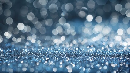 Soft blue bokeh circles dance in abstract background rhythm