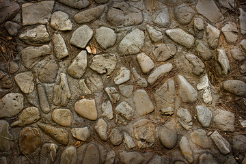 Wall Mural - Abstract background stone wall close-up