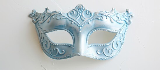 Leinwandbilder - A beautiful light blue mask. Photographed using a white background. with copy space image. Place for adding text or design