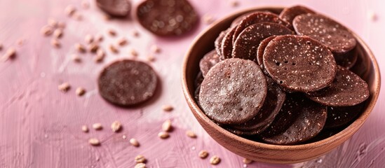 Aufkleber - Ragi Chips or Nachni or finger millet wafers, Indian healthy snack pastel background. with copy space image. Place for adding text or design