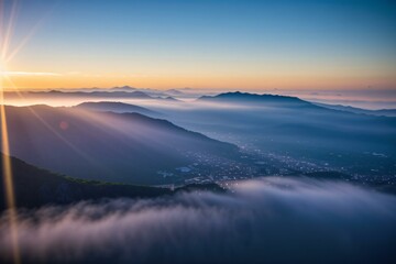 Wall Mural - Majestic mountains bathed in golden light, from sunrise to sunset, create a breathtaking landscape