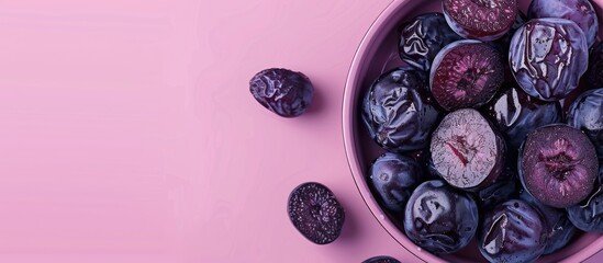Leinwandbilder - Prunes in Dish pastel background  Food  Isolated  Nature. with copy space image. Place for adding text or design