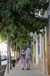 © Tatiana - Old couple walking in the city