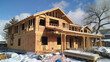 © Sawyer0 - Implementing mineral wool and foam insulation on the roof of a new house is a key step towards energy efficiency.