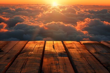 Wall Mural - Wooden table top with view of sunset above the clouds. Product display background