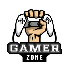 Wall Mural - The hand holds the controller. Hardcore gamer logo.