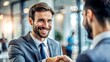 © theartcreator - Friendly Business Partners Handshake in Modern Office Lobby, Business Collaboration Concept with Smiling Man Handshaking