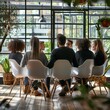 © Surachetsh - Formal business meeting where coworkers, shareholders, or clients discuss private ideas and analyze data reports to find solutions together.