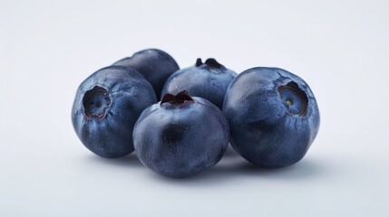 Wall Mural - Fresh blueberries arranged on a white background