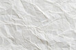 © Sathaporn - White crumpled paper background