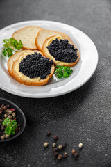 Poster - caviar lump fish seafood black caviar fresh meal food snack on the table copy space food background rustic top view