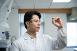 © zhu difeng - doctor working in laboratory