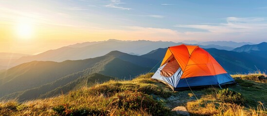 Sticker - camping tent in the top of mountain in the morning. copy space image. place for adding text or desig