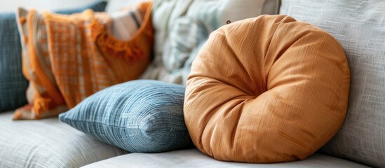 U shaped pillows on the patterned cushion, Natural light background. Copy space image. Place for adding text and design
