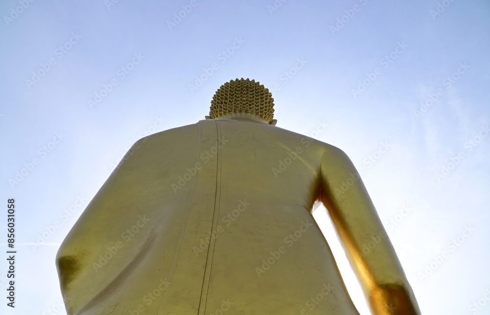 The Big Golden Buddha Statue with blue sky and white cloud in Buddhist ...