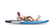© Ljupco Smokovski - Young man sitting on a SUP board with a westie terrier dog