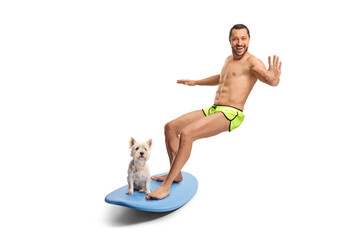 Sticker - Fit young man and a dog on a surfboard