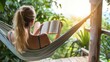 © Chayna - A woman reading a book in a hammock on a lazy afternoon.