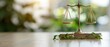 © Naret - Close-up of a golden legal scale on a wooden table with a blurred green background, symbolizing justice, balance, and law.