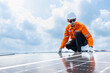 © Quality Stock Arts - Professional Engineer Service Solar Panel. Worker Maintenance Cleaning Replacing Solar Panel. Solar photovoltaic panel system in Industry roof. Saving Energy with Clean Power.