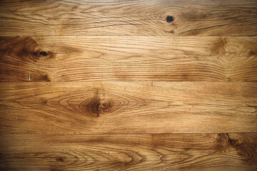 A closeup of the surface texture of oak wood, showcasing its natural grain and beauty