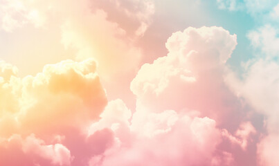 Wall Mural - Beautiful pastel pink and yellow clouds background, sky with soft colors, vintage, ethereal, dreamy, magical, light and airy, minimalistic