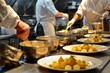 © spyrakot - Professional Chefs Preparing Elegant Multi-Course Potato Dishes in a High-Energy Kitchen