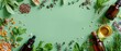 © Purichaya - Herbal medicine ingredients, including essential oils and dried herbs, displayed on a green background, ideal for natural remedy presentations