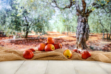 Sticker - Peach fruit on table in the park. Picnic table and healthy food.