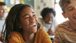 © VK Studio - Teenagers sharing a joyful moment in a classroom, laughing and radiating happiness and camaraderie.