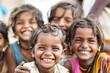 © Jasmina - Group of diverse, cheerful multi-ethnic children from India smiling and looking at the camera outdoors