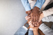 © M. Cunningham/peopleimages.com - Business people, hands stack and support above for collaboration and inclusion in office for equality. Workplace community, staff and huddle together for solidarity and cooperation with team building