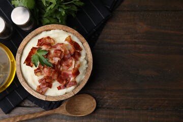 Wall Mural - Fried bacon, mashed potato, parsley and spoon on wooden table, top view. Space for text