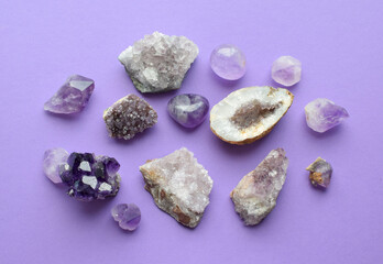 Wall Mural - Beautiful purple drusy crystals and amethyst geodes close up. Healing crystals.