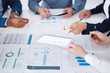 © peopleimages.com - Meeting, paperwork and business people hands with tablet for teamwork and infographic with sales feedback. Documents, staff and tech screen with data analytics for global income statistics in office