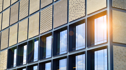 Wall Mural - Facade of building with  modern elements. Exterior of a modern industrial building. 