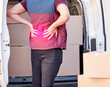 © FrameFlex/peopleimages.com - Man, delivery and back injury with boxes for pain, accident or emergency from parcel, packages or cargo. Male person or courier guy with red glow for sore spine, ache or inflammation by vehicle