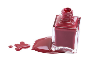 Wall Mural - Bottle and spilled red nail polish isolated on white