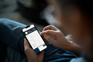 businessman using mobile phone in open office