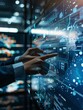 © Boontharika - Close-up of hands interacting with digital display, analyzing data, navigating virtual interface with futuristic technology in modern workspace.