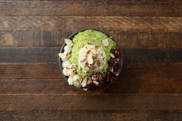 Wall Mural - A top down view of a matcha bingsu bowl.