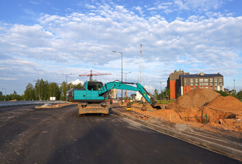 Poster - Excavator on groundwork. Backhoe dig ground on Construction site. Roadworks. Excavator on earthworks for road construction. Stormwater dig, sewer pipe. Storm Sewer build construction. Housing.